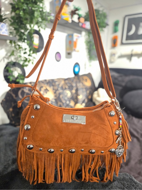 True Religion Handbags - True Religion Faux suede fringe purse with silver studs and a heart charm